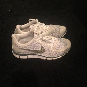 White Leopard Nike tennis shoes
